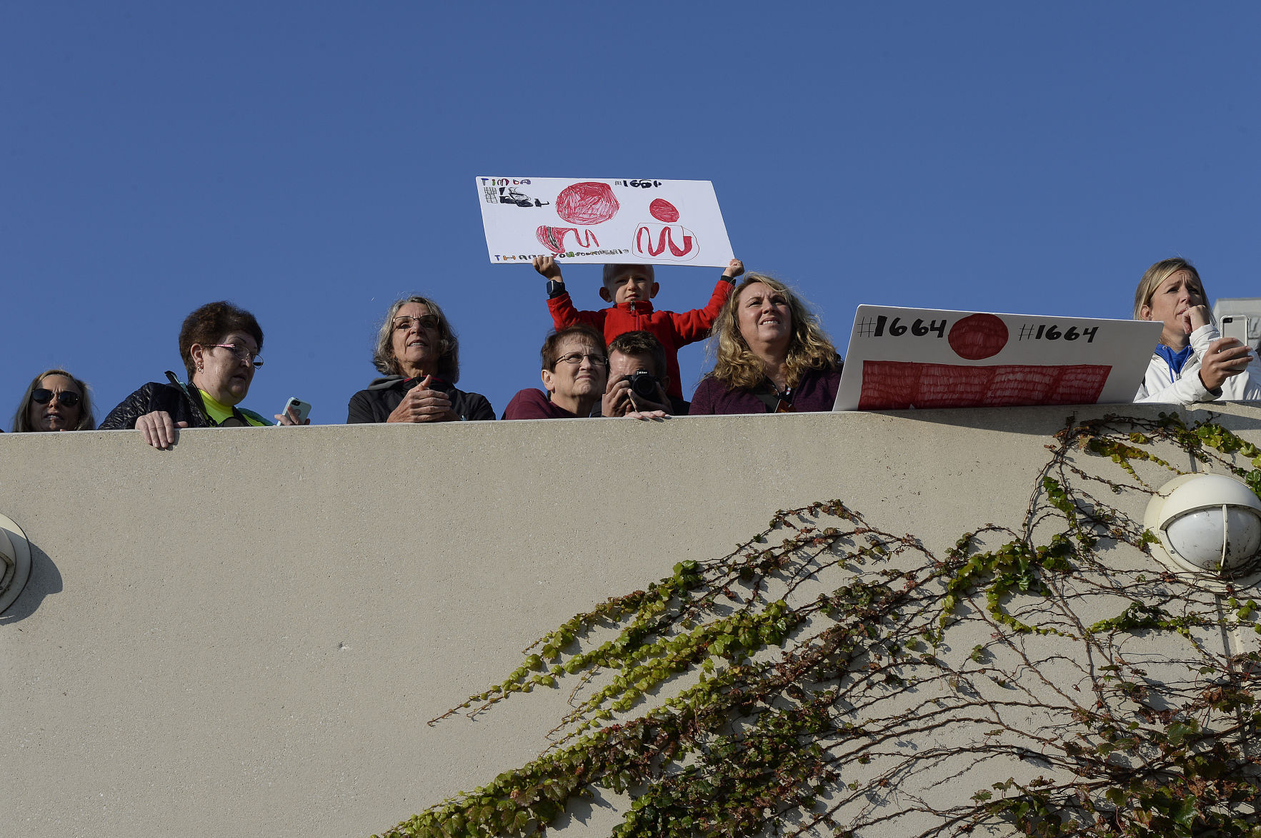 Fans cheer on IRONMAN athletes